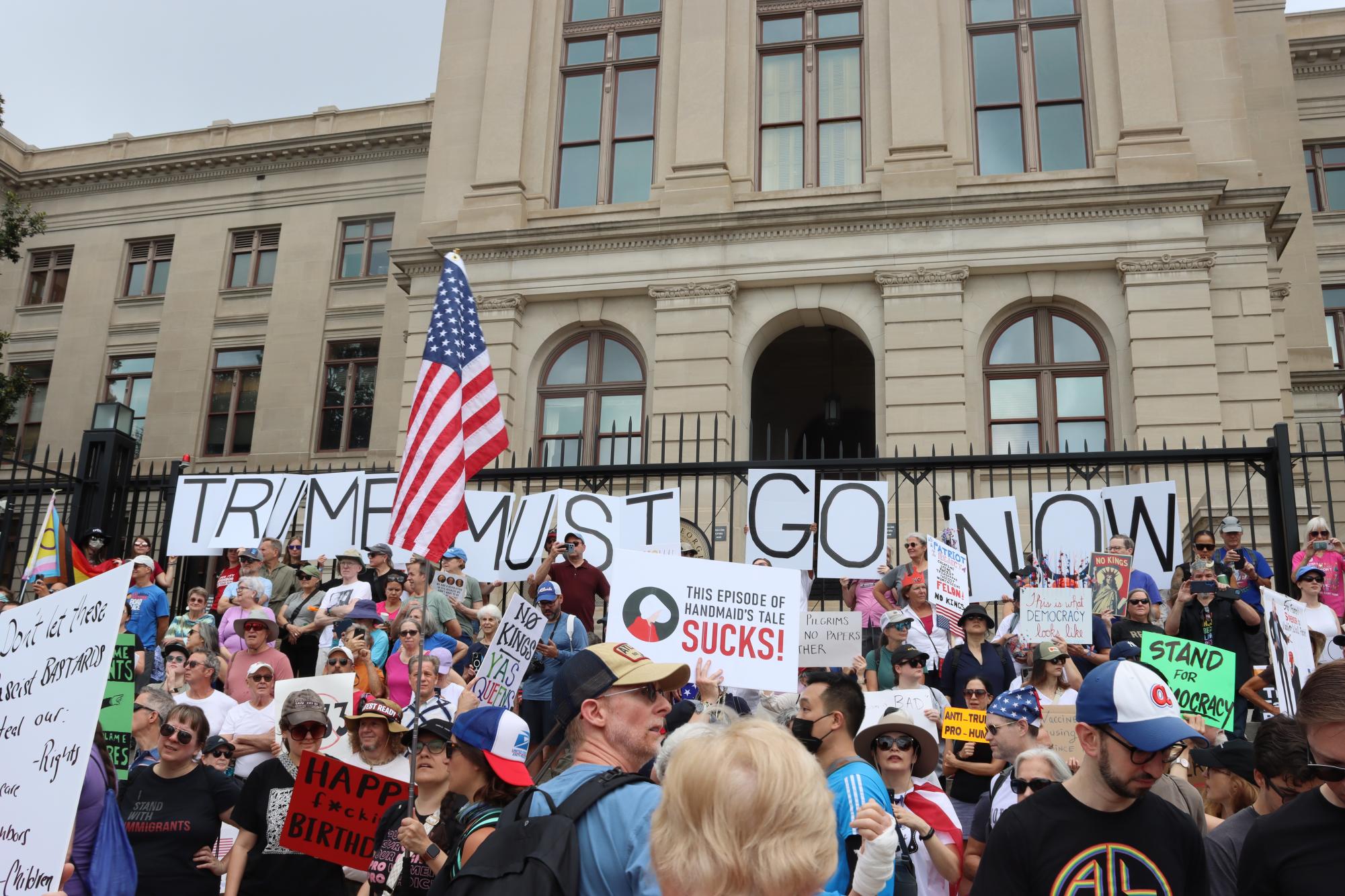SIGNS OF THE TIMES: Protesters united over the No Kings message, with signs such as "no kings, yas queens."