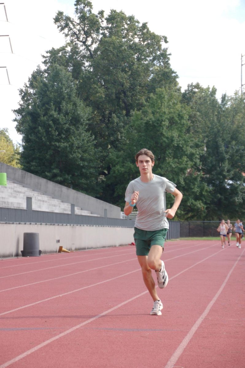 Senior Captain Dries Williams participates in a strides drill on Aug 29th to prepare for upcoming meets. 
