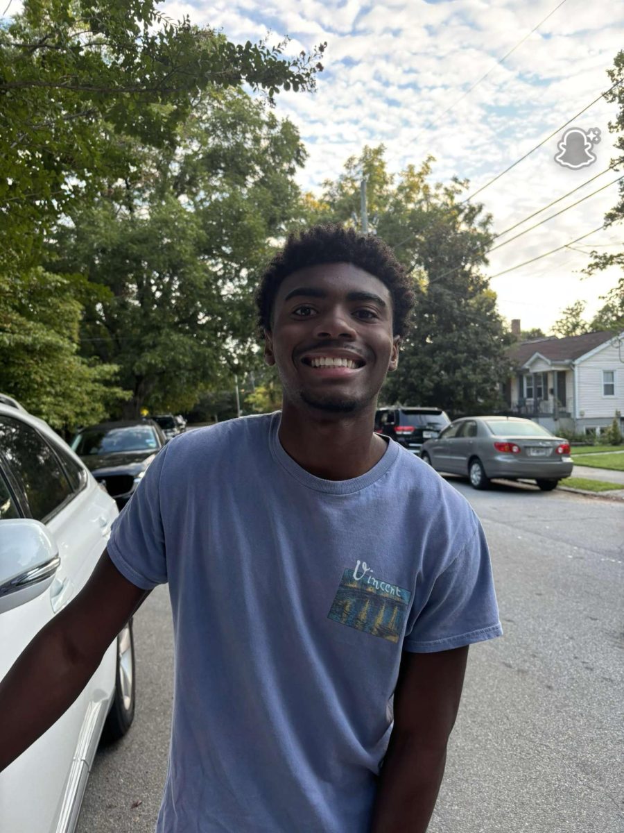 Junior Seth Tilley smiles before going into school in the morning.