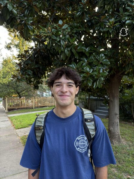 Junior Joseph Medina smiles outside of school in the morning.