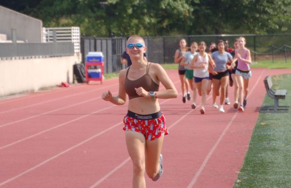 Junior captain James Roberts begins practice with a warm up lap around the track on Aug. 29.