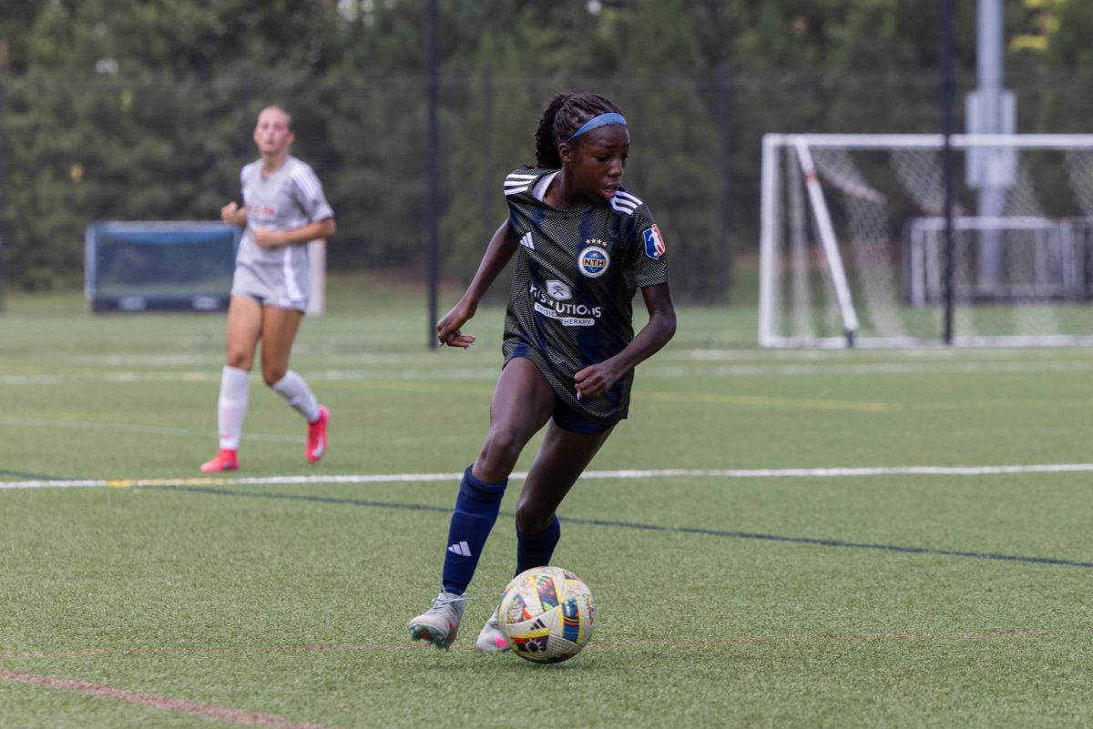 Freshman Sydney Eaton dribbles ball down the field at Carolina Elite Soccer Academy in August 2025