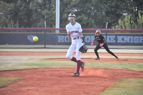 Senior Ava Anderson pitches to Maynard Jackson batter on Sept. 30. The Knights won the game 18-1.