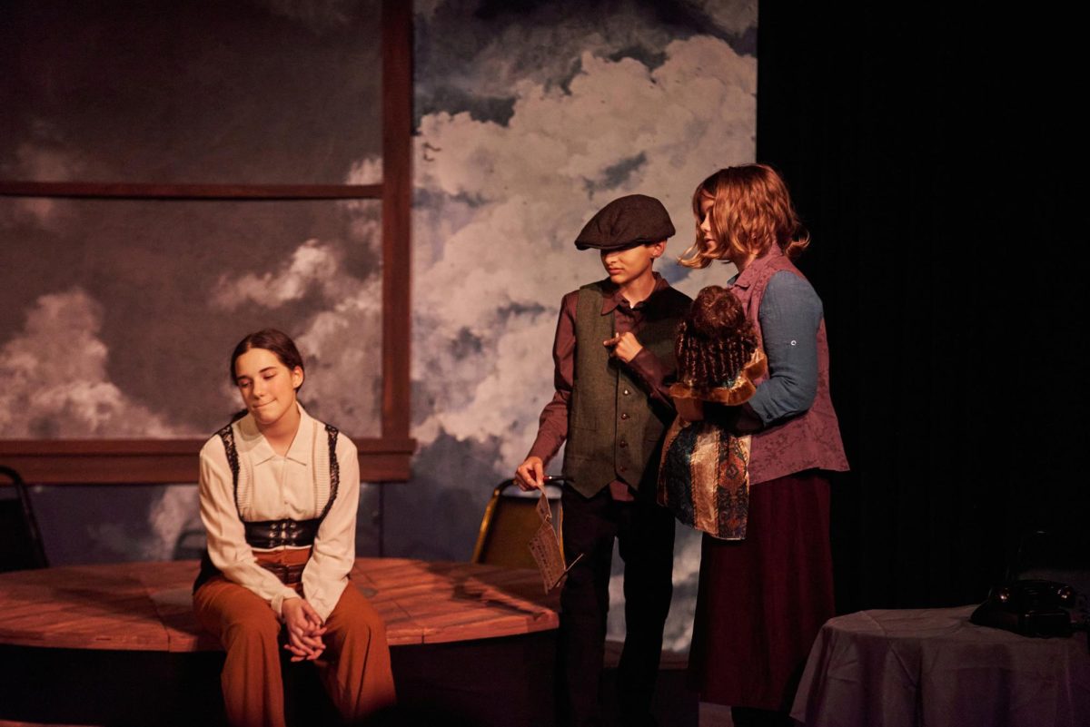 ON STAGE: Sophomore Mia Pivoshenko and junior Kyber Gupta stage a scene in the 2022 production of ‘The Three Musketeers and the Very Shiny Diamonds.’ The Synchronicity Theatre program has taught students important lessons through theatre.