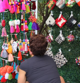 SENSATIONAL SMALL BUSINESS: Angelica Beristain showcases her felt decorations at Fall Fest. Her handmade creations are sold from her female-owned business.