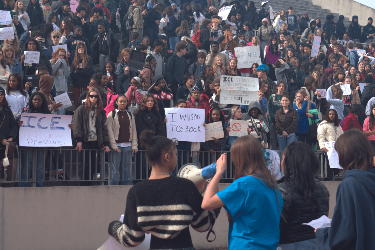 SPEAKING OUT: Midtown students Abbie Farr, Zoe Norwood, Sabrina King, Eris Mitchell and Aiyana Bagwell helped organize the walkout against the U.S. Immigration and Customs Enforcement on Thursday, Jan. 29. They led speeches and chants.
