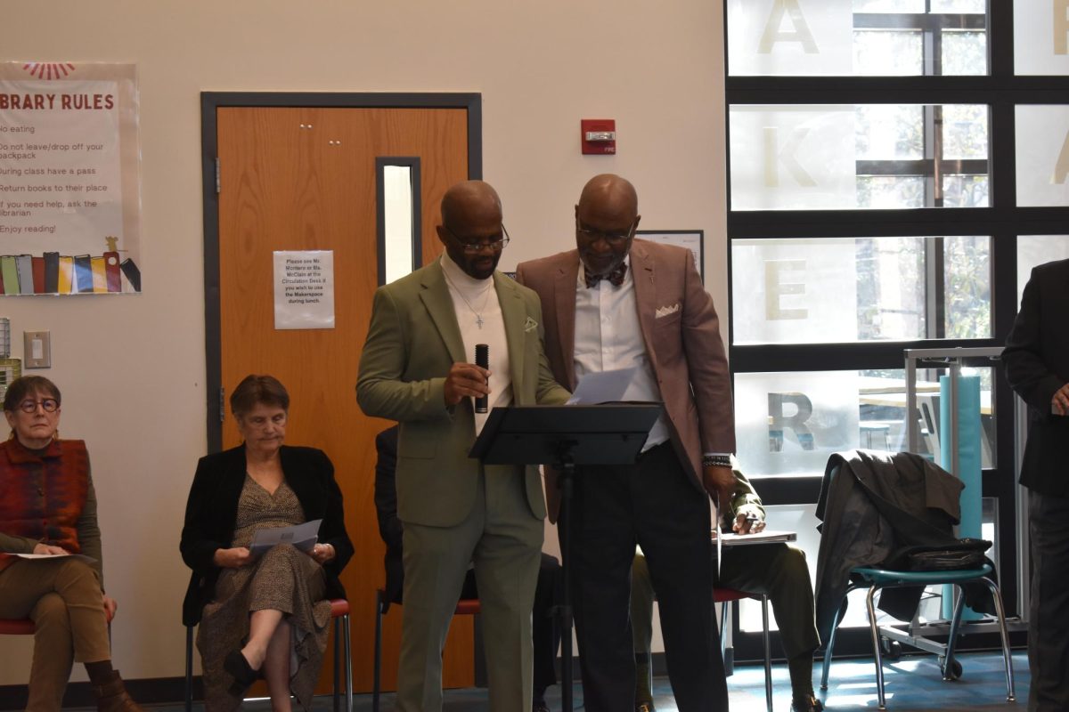 SPECIAL SPEECH: During the naming ceremony for the library on Feb. 7, Bobby Dennis (left) along with numerous other alumni and former teachers as Grady spoke about their experience with Dr. Adger and his principalship.