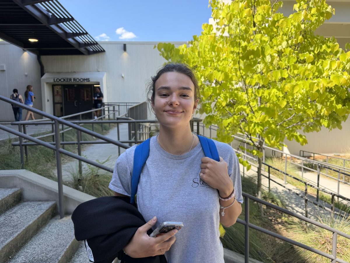 Senior Stella Brown enjoys the nice weather before heading home after the school day.