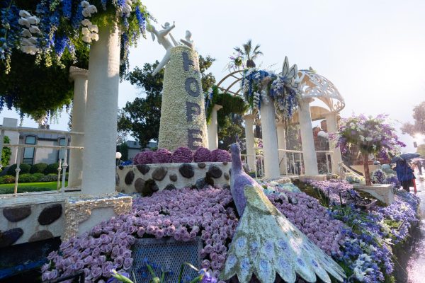 SYMBOL OF HOPE: City of Hope's Rose Parade float rolls through Pasadena, California on Jan. 1, carrying survivors and advocates including Atlanta's own Tyler Blue. CREDIT: City of Hope