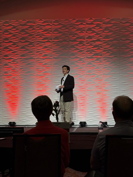 SPEAKING OUT: North Atlanta sophomore John Henry Collins gave a speech explaining that trees being replaced by concrete and flooding that happens in neighborhoods when it rains demonstrate that the city must grow with direction to secure a better future.