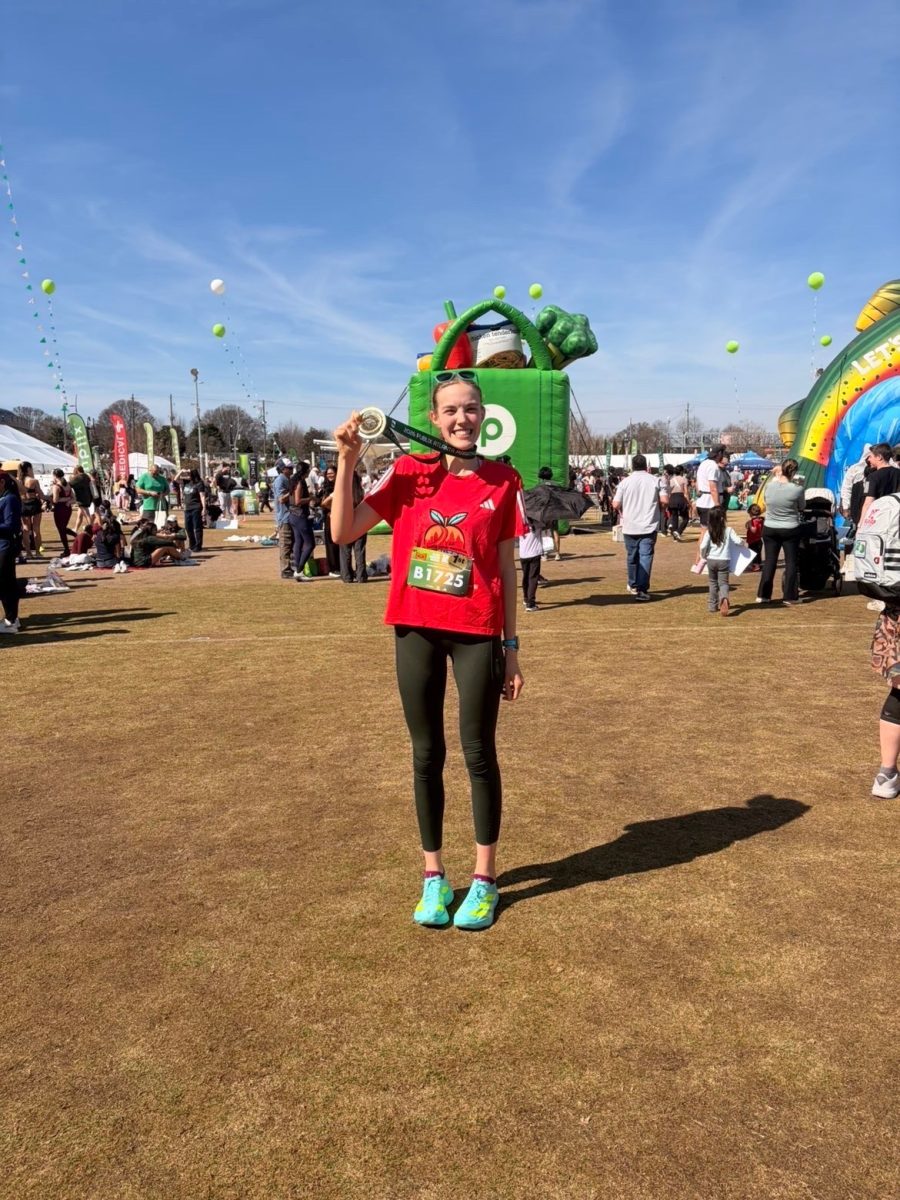 Senior Hailey Wortmann holds her medal
after finishing the Publix Atlanta Marathon on March 1, 2026.