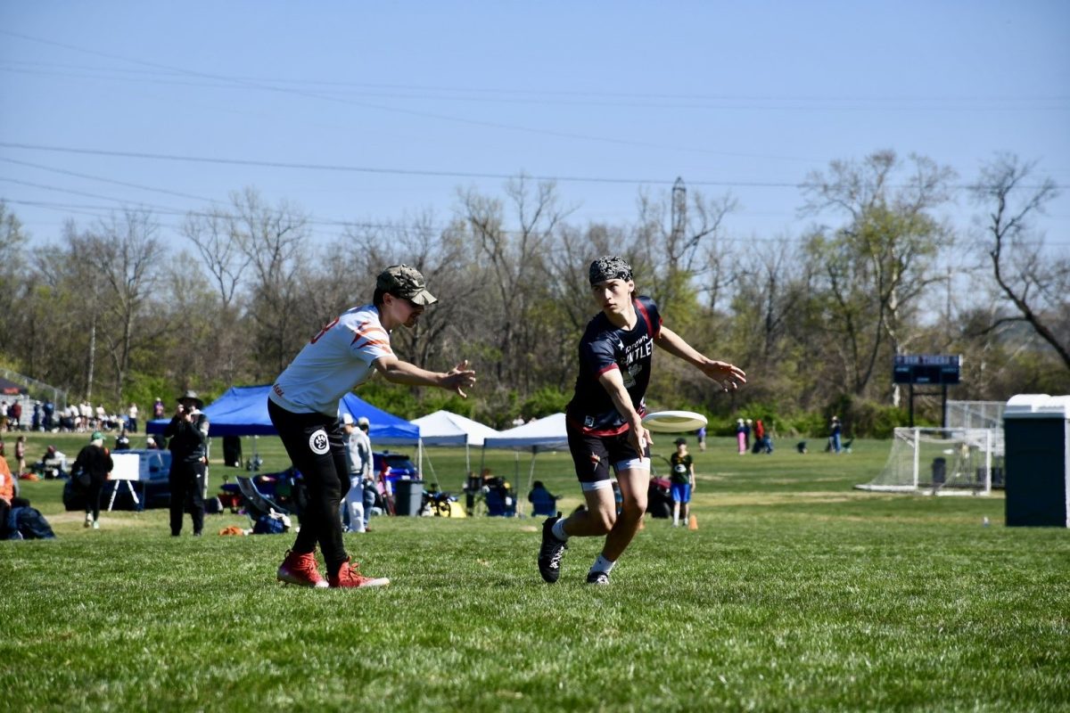 Senior Grady Richman throws to a teammate on March 29 in a 13-8 win against Edwardsville at the River Campus Classic. Richman was selected to join the Atlanta Hustle, Atlanta's professional ultimate frisbee team.